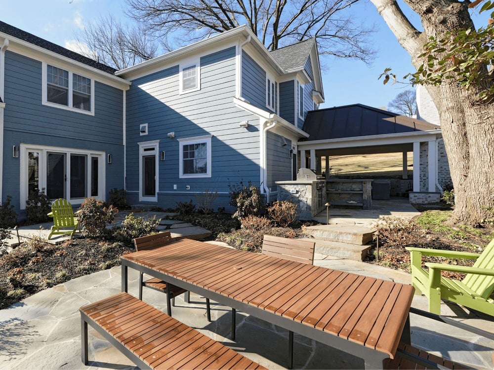 Exterior of Home Addition in DC with a Covered Porch and Sitting Area