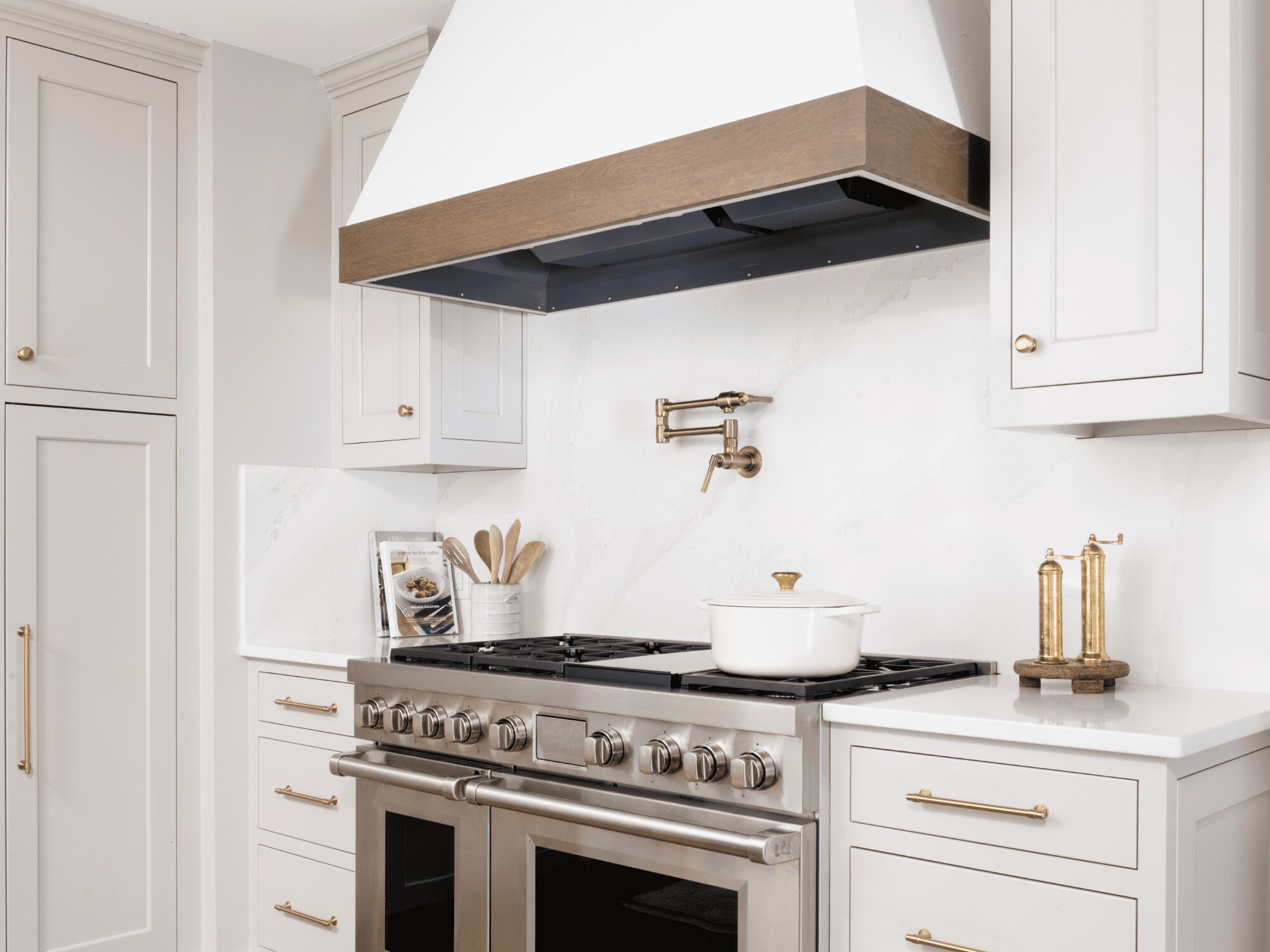 Custom Range Hood and Pot Filler in Kitchen Remodel